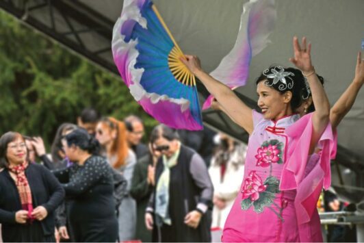 Women dance during Chinese Culture Days at the Missouri Botanical Garden.