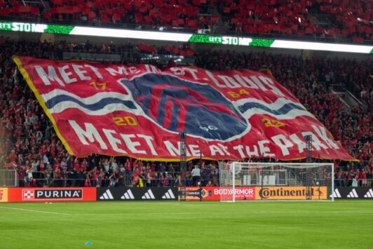At a St. Louis CITY SC home game, a banner reads, 