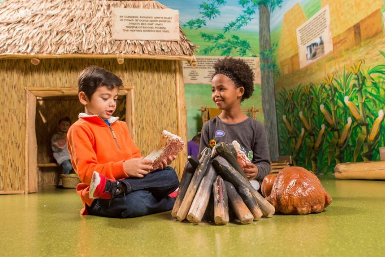 Kids play in the History Clubhouse at the Missouri History Museum.