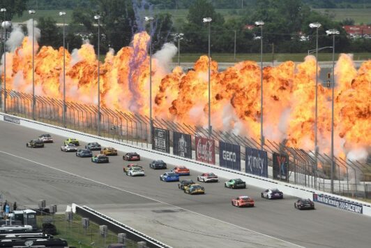 During the NASCAR Cup Series race in St. Louis, flames ignite around the track.
